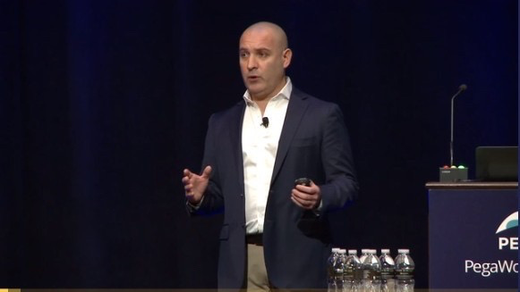 Fabian Abacum presenting on stage at PegaWorld 2019